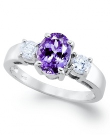 A true beauty. This stunning ring features an oval-cut tanzanite center stone (1-3/8 ct. t.w.) accented by round-cut diamonds on the sides (3/8 ct. t.w.). Set in 14k white gold. A true beauty. This stunning ring features an oval-cut tanzanite center stone (1-3/8 ct. t.w.) accented by round-cut diamonds on the sides (3/8 ct. t.w.). Set in 14k white gold.
