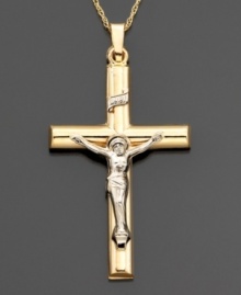 A stunning crucifix enhanced by lustrous two-tone 14k gold. Approximate length: 1-1/2 inches. Chain not included. A stunning crucifix enhanced by lustrous two-tone 14k gold. Approximate length: 1-1/2 inches. Chain not included.