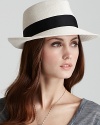 A gorgeous packable fedora with a contrast ribbon trim.