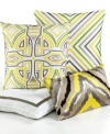 Featuring a white background with grey, beige, black & yellow embroidery, this Trina Turk decorative pillow adds a burst of color and modern sophistication to your bed.