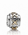 A sterling silver and 14K gold PANDORA charm with a graphic laced-up pattern.