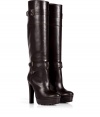 This high-octane take on the classic biker boot from Belstaff will add a tough-meets-chic aesthetic to your casual look - Rounded toe, buckled straps, covered leather platform and blocky heel, rubber lug sole, pull-on style - Hits at the knee - Pair with skinny jeans, a feminine blouse and biker jacket