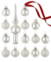 Find more than a few silver linings in Kurt Adler's mini Christmas ornaments. Glass with a matte or shiny finish is striped and spotted with metallic glitter, creating an altogether elegant tree.