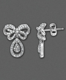 Tied up sweetly like a gift, these bow-shaped 14k white gold stud earrings glimmer with round-cut diamonds (1/2 ct. t.w.). Approximate drop: 3/4 inch. Tied up sweetly like a gift, these bow-shaped 14k white gold stud earrings glimmer with round-cut diamonds (1/2 ct. t.w.). Approximate drop: 3/4 inch.