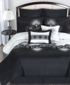 A dramatic black and white palette gives this Esme comforter set a chic and sophisticated look. Embellished with a modern floral pattern, striped accents and a lustrous sheen, this set makes a full impact in the bedroom.