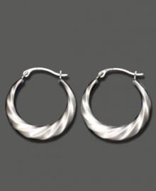 Shining swirls add dimension and texture to these 14k white gold hoop earrings. Approximate diameter: 1/2 inch. Shining swirls add dimension and texture to these 14k white gold hoop earrings. Approximate diameter: 1/2 inch.
