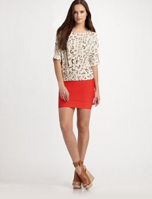 This silky, slouchy style is patterned with a wildly appealing abstracted animal print.Jewel necklineElbow-length sleeves with rool-tab cuffsPleated front detailPolyesterDry cleanImportedModel shown is 5'9½ (176 cm) wearing US size Small. This silky, slouchy style is patterned with a wildly appealing abstracted animal print.Jewel necklineElbow-length sleeves with rool-tab cuffsPleated front detailPolyesterDry cleanImportedModel shown is 5'9½ (176 cm) wearing US size Small.