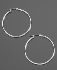 These delicate hoop earrings are the perfect compliment to your dressed-up style or everyday look. Crafted in 14k white gold. Approximate diameter: 3/8 inch. These delicate hoop earrings are the perfect compliment to your dressed-up style or everyday look. Crafted in 14k white gold. Approximate diameter: 3/8 inch.