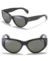 Retro-inspired cat eye sunglasses by Ray-Ban, one of the must-have accessories of the season.