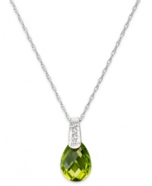 Take your look to the next level with the right amount of color. A pear-cut peridot (2-1/5 ct. t.w.) adds the sparkle to this shining 14k white gold necklace with diamond accents at the bail. Approximate length: 18 inches. Approximate drop: 1/2 inch. Take your look to the next level with the right amount of color. A pear-cut peridot (2-1/5 ct. t.w.) adds the sparkle to this shining 14k white gold necklace with diamond accents at the bail. Approximate length: 18 inches. Approximate drop: 1/2 inch.