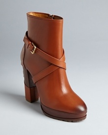 Ralph Lauren Collection has mastered equestrian elegance, as illustrated by these polished, ankle-strap booties. The height of perfection, covered heels feature special buckle details. Ralph Lauren Collection has mastered equestrian elegance, as illustrated by these polished, ankle-strap booties. The height of perfection, covered heels feature special buckle details.