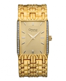 An opulent dress watch with details in all the right places. By Caravelle by Bulova. Gold tone mixed metal bracelet and rectangular case crystallized with Swarovski elements at left and right. Gold tone sunray dial features applied stick indices, three hands and logo. Quartz movement. Water resistant to 30 meters. Two-year limited warranty.