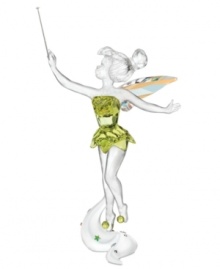 Looking ever so magical in Swarovski crystal, Disney's Tinkerbell figurine takes flight and raises her wand, sprinkling pixie dust on lost boys and girls everywhere.