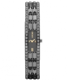 A gorgeous watch from DKNY with a half-bangle silhouette and shimmering crystal accents. A gorgeous watch from DKNY with a half-bangle silhouette and shimmering crystal accents.
