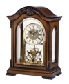 A timeless decorative accent, by Bulova. This solid wood mantel clock with an Old World walnut finish perfectly suits an office. Decoratively carved case with screened glass front and side panels and removable clear acrylic back houses a metal dial and revolving crystal pendulum. Plays Westminster melody on the hour.