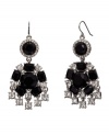 A sophisticated silhouette. A circular shape adds an intriguing design detail to these distinctive chandelier earrings from Monet. Set in silver tone mixed metal, they're embellished with glass crystal and jet resin accents. Approximate drop: 2-1/4 inches.