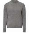 Quietly elegant and effortlessly cool, Jil Sanders light grey wool pullover raises the bar on everyday indispensables - Classic crew neck style, in a soft, densely woven medium-weight Italian wool - Rib trim at cuffs, collar and sleeves - Slim, straight cut - Versatile and polished, seamlessly transitions from work to weekend - pair with slim trousers, chinos or dark denim