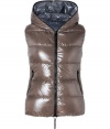 Sporty and sleek, this slim down vest from Duvetica is a cold weather must-have - Hood with decorative zipper trim, dual-zip front closure, sleeveless, zip pockets, quilted - Slim fit - Wear with an oversized pullover, leather leggings or skinny jeans, and ankle booties