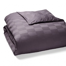 A classic check pattern in cotton jacquard infuses this luxe duvet cover with textural richness. A classic check pattern in cotton jacquard infuses this luxe duvet cover with textural richness.