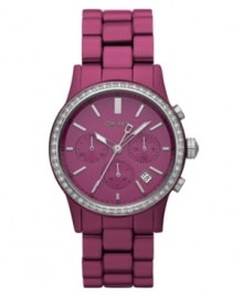 Step out and make a statement with this playful yet chic watch by DKNY. Purple aluminum bracelet and round purple aluminum-plated stainless steel case. Bezel embellished with crystal accents. Glossy purple chronograph dial features applied stick indices, minute track, three subidals, date window, three hand and logo. Quartz movement. Water resistant to 50 meters. Two-year limited warranty.