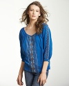 Intricate embroidery lends worldly flair to this bohemian-chic Velvet by Graham & Spencer top.