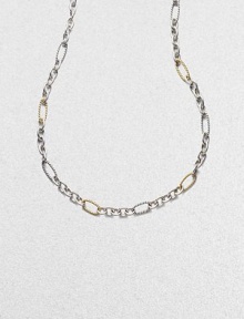 A bold and smart combination of cabled and smooth, large and small oval links in sterling silver and 18k yellow gold. 18k yellow gold and sterling silver Length, about 32 Lobster clasp Made in USA