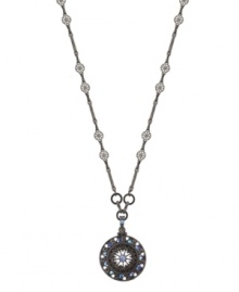 You'll come full circle in 2028's stylish round pendant necklace. Bedecked with aurora borealis crystals, it's set in hematite tone mixed metal. Approximate length: 16 inches + 2-inch extender. Approximate drop: 1 inch. You'll come full circle in 2028's stylish round pendant necklace. Bedecked with aurora borealis crystals, it's set in hematite tone mixed metal. Approximate length: 16 inches + 2-inch extender. Approximate drop: 1 inch.