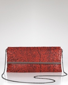 Evening style gets a touch exotic with this printed mesh clutch from BCBG Max Azria. In a bold hue, it's as striking as it is party-ready. Evening style gets a touch exotic with this printed mesh clutch from BCBG Max Azria. In a bold hue, it's as striking as it is party-ready.