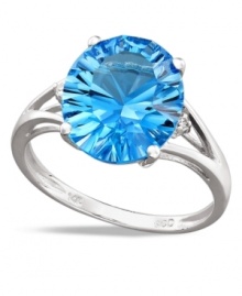 Polish your look in cool blue hues. This vibrant ring features an oval-cut blue topaz (5 ct. t.w.) and sparkling diamond side accents. Crafted in 14k white gold. Polish your look in cool blue hues. This vibrant ring features an oval-cut blue topaz (5 ct. t.w.) and sparkling diamond side accents. Crafted in 14k white gold.