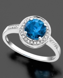 Stately in its simplicity, this 14k white gold ring features round-cut blue topaz (1-5/8 ct. t.w.) and round-cut diamond (1/8 ct. t.w.). Stately in its simplicity, this 14k white gold ring features round-cut blue topaz (1-5/8 ct. t.w.) and round-cut diamond (1/8 ct. t.w.).