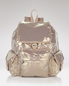 Whether going downtown or out of town, LeSportsac's nylon backpack gets you there with ease. Shoulder this pocket-trimmed style to keep the essentials packed and pretty. Whether going downtown or out of town, LeSportsac's nylon backpack gets you there with ease. Shoulder this pocket-trimmed style to keep the essentials packed and pretty.