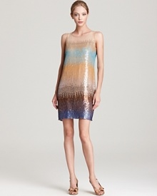 An inimitable cocktail look for the summer party season, this KAS New York sequin dress in vibrant ombre is a traffic stopping sensation. Punctuate the look with a nude silk heel and a sleek clutch and consider yourself fête-fabulous.