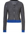 With a chic mix of pattern and colorblock, Steffen Schrauts jacquard woven jacket is a contemporary way to dress up workweek looks - Collarless, long sleeves, royal blue cuffs and trim, button-down front - Tailored fit - Wear over a sheath dress with pin heels and a leather tote, or try with an elevated jeans-and-tee ensemble