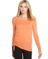 A drawstring tie adds an element of ruching to this Calvin Klein sweater -- adjust the hem length for different looks!