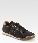 Bi-color piping sharpens the profile of an enduring suede silhouette. Leather liningPadded insoleRubber soleImported