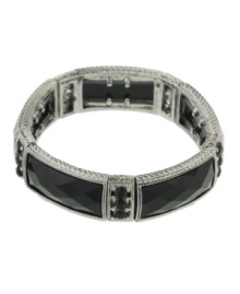 Not so basic black -- make a striking statement in shapely design. 2028's stretch cuff features a rectangular jet enamel design set in silver tone mixed metal. Bracelet stretches to fit wrist. Approximate diameter: 2-1/2 inches. Not so basic black -- make a striking statement in shapely design. 2028's stretch cuff features a rectangular jet enamel design set in silver tone mixed metal. Bracelet stretches to fit wrist. Approximate diameter: 2-1/2 inches.