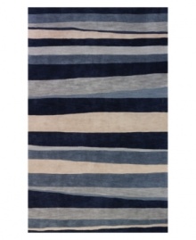 A bold, striped pattern fashioned in rich shades of blue and beige creates a captivating look that integrates beautifully with any transitional or contemporary decor. Rife with lush texture and detail, this luxurious area rug from Dalyn is beautifully hand tufted in polyester and acrylic, ensuring superior color retention and long-lasting wear. A bold, striped pattern fashioned in rich shades of blue and beige creates a captivating look that integrates beautifully with any transitional or contemporary decor. Rife with lush texture and detail, this luxurious area rug from Dalyn is beautifully hand tufted in polyester and acrylic, ensuring superior color retention and long-lasting wear.