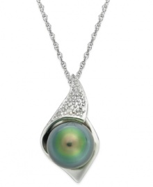 Polish, shine and complete sophistication. This timeless pendant combines a cultured Tahitian freshwater pearl (8-9 mm) with diamond accents in sterling silver. Approximate length: 18 inches. Approximate drop length: 7/8 inch. Approximate drop width: 1/2 inch. Polish, shine and complete sophistication. This timeless pendant combines a cultured Tahitian freshwater pearl (8-9 mm) with diamond accents in sterling silver. Approximate length: 18 inches. Approximate drop length: 7/8 inch. Approximate drop width: 1/2 inch.