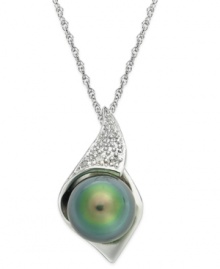 Polish, shine and complete sophistication. This timeless pendant combines a cultured Tahitian freshwater pearl (8-9 mm) with diamond accents in sterling silver. Approximate length: 18 inches. Approximate drop length: 7/8 inch. Approximate drop width: 1/2 inch.