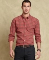 Pull off a put-together look with ease in this plaid shirt from Tommy Hilfiger.