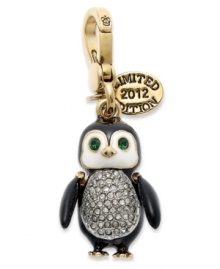 This marching penguin charm from Juicy Couture sparkle with glass accents. Crafted in gold tone mixed metal. Approximate drop: 1-3/4 inches.