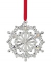 Dream of a silver Christmas. Crafted in lustrous silver plate, the 2012 Snow Majesty snowflake ornament features twinkling crystal gems and a dated tag to commemorate this year's celebration.