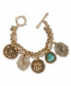 Charm your friends with this fun toggle bracelet from Lucky Brand. Crafted in gold tone mixed metal, this double-chain bracelet features a variety of charms and semi-precious, reconstituted turquoise stones with a trendy toggle clasp. Approximate length: 7-2/3 inches.