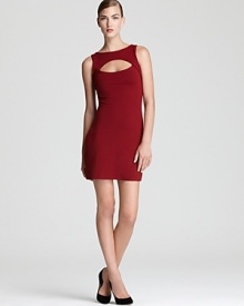 A front cutout lends a provocative look to a fitted bodycon dress from Susana Monaco.