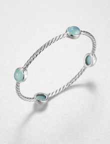 From the Renaissance Collection. Let this beautiful piece take you back in time with cabochon aqua chalcedony stations on an iconic sterling silver cable design. Aqua chalcedonySterling silverDiameter, about 2.25Slip-on styleImported 