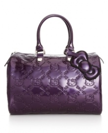 Take a closer look and you'll see this pretty satchel showcases a sweet surprise. The quilted design by Hello Kitty features the classic kitty face embossed on bag with signature silvertone hardware and a sweet bow charm. Take a closer look and you'll see this pretty satchel showcases a sweet surprise. The quilted design by Hello Kitty features the classic kitty face embossed on bag with signature silvertone hardware and a sweet bow charm.