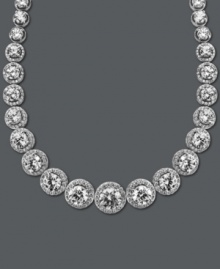 A chic collar perfect for cocktail hour. Arabella's dazzling design highlights dozens of round-cut Swarovski zirconias (55-1/3 ct. t.w.) set in sterling silver. Approximate length: 17 inches. A chic collar perfect for cocktail hour. Arabella's dazzling design highlights dozens of round-cut Swarovski zirconias (55-1/3 ct. t.w.) set in sterling silver. Approximate length: 17 inches.