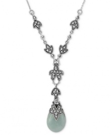Earthy elegance. Genevieve & Grace's Y-shaped necklace is crafted from sterling silver, with a flower motif, as well as marcasite and jade (16-1/2 ct. t.w.) adding to the appeal. Approximate length: 16 inches. Approximate drop: 1 inch. Approximate width: 1/2 inch. Earthy elegance. Genevieve & Grace's Y-shaped necklace is crafted from sterling silver, with a flower motif, as well as marcasite and jade (16-1/2 ct. t.w.) adding to the appeal. Approximate length: 16 inches. Approximate drop: 1 inch. Approximate width: 1/2 inch.