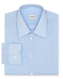 Made from superior cotton and featuring a handsome allover check print, this refined and reserved dress shirt offers the modern man an on-trend slim silhouette for a polished look in and outside the office. Made from superior cotton and featuring a handsome allover check print, this refined and reserved dress shirt offers the modern man an on-trend slim silhouette for a polished look in and outside the office.