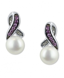 Stand out, in style. This pair of sterling silver earrings, with cultured freshwater pearls (6-1/2-7 mm), pink sapphire (1/8 ct. t.w.) and single-cut diamond accents, proves to be quite captivating. Approximate drop: 5/8 inch. Stand out, in style. This pair of sterling silver earrings, with cultured freshwater pearls (6-1/2-7 mm), pink sapphire (1/8 ct. t.w.) and single-cut diamond accents, proves to be quite captivating. Approximate drop: 5/8 inch.
